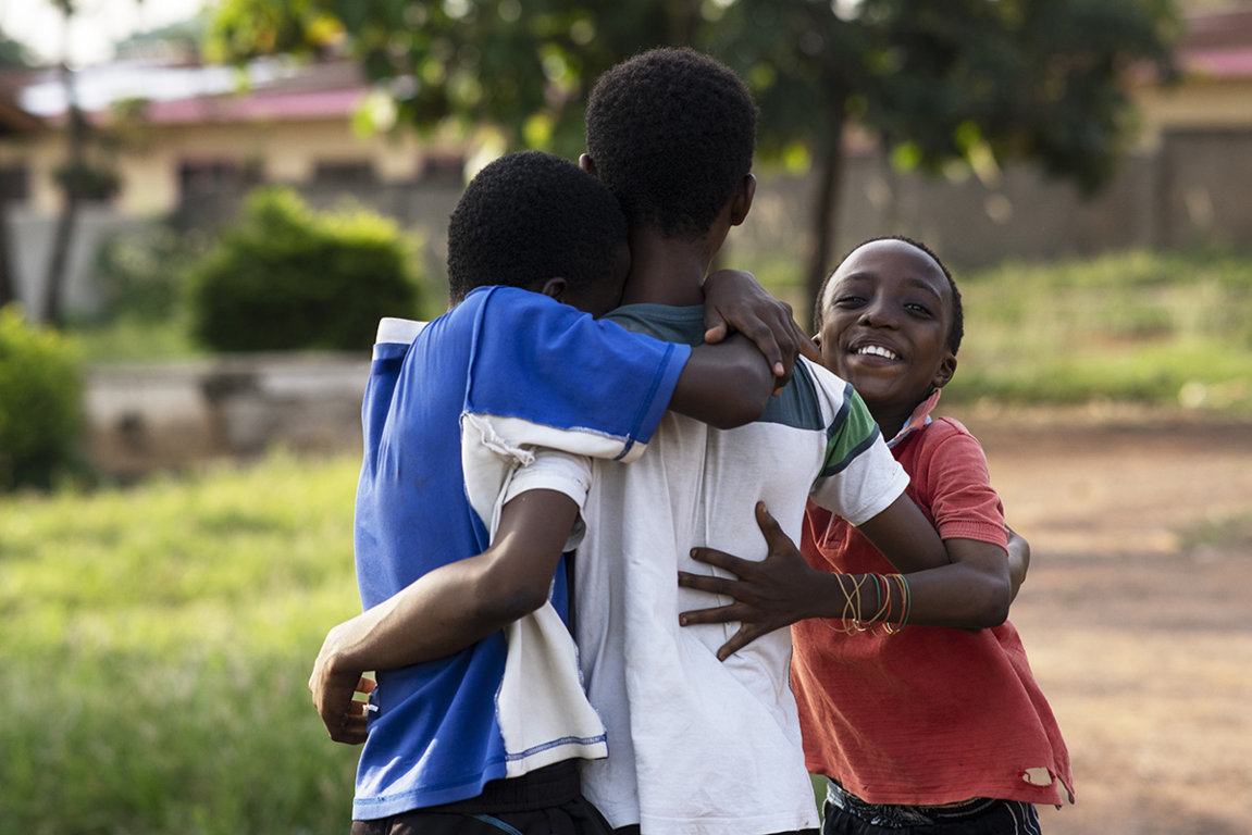 happy friends hugging